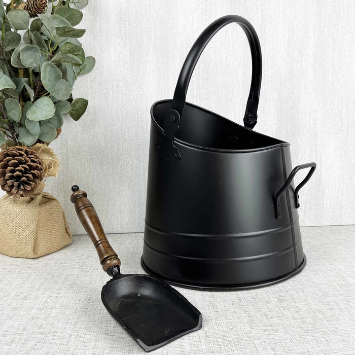 Black Coal Bucket with Teak Handle Shovel with autumn leafy tree, on white background