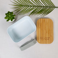 White Eco Bamboo & Wheat Fibre Lunch / Bento Box on white background and greenery