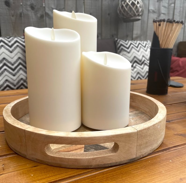 Luminara Outdoor Flameless Battery Candles on outside dining area