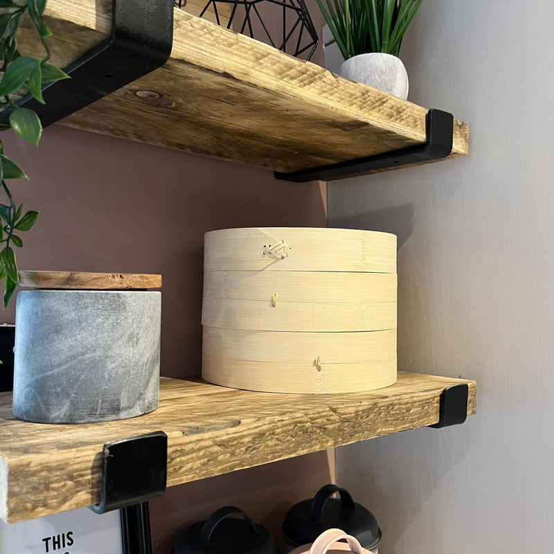 Two-Tier Bamboo Steamer on wooden kitchen shelves