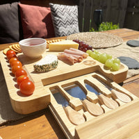Bamboo Cheese Board & Cheese Knife Set on garden dining table. 