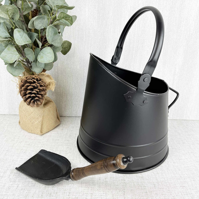 Black Coal Bucket with Teak Handle Shovel with autumn leafy tree, on white background
