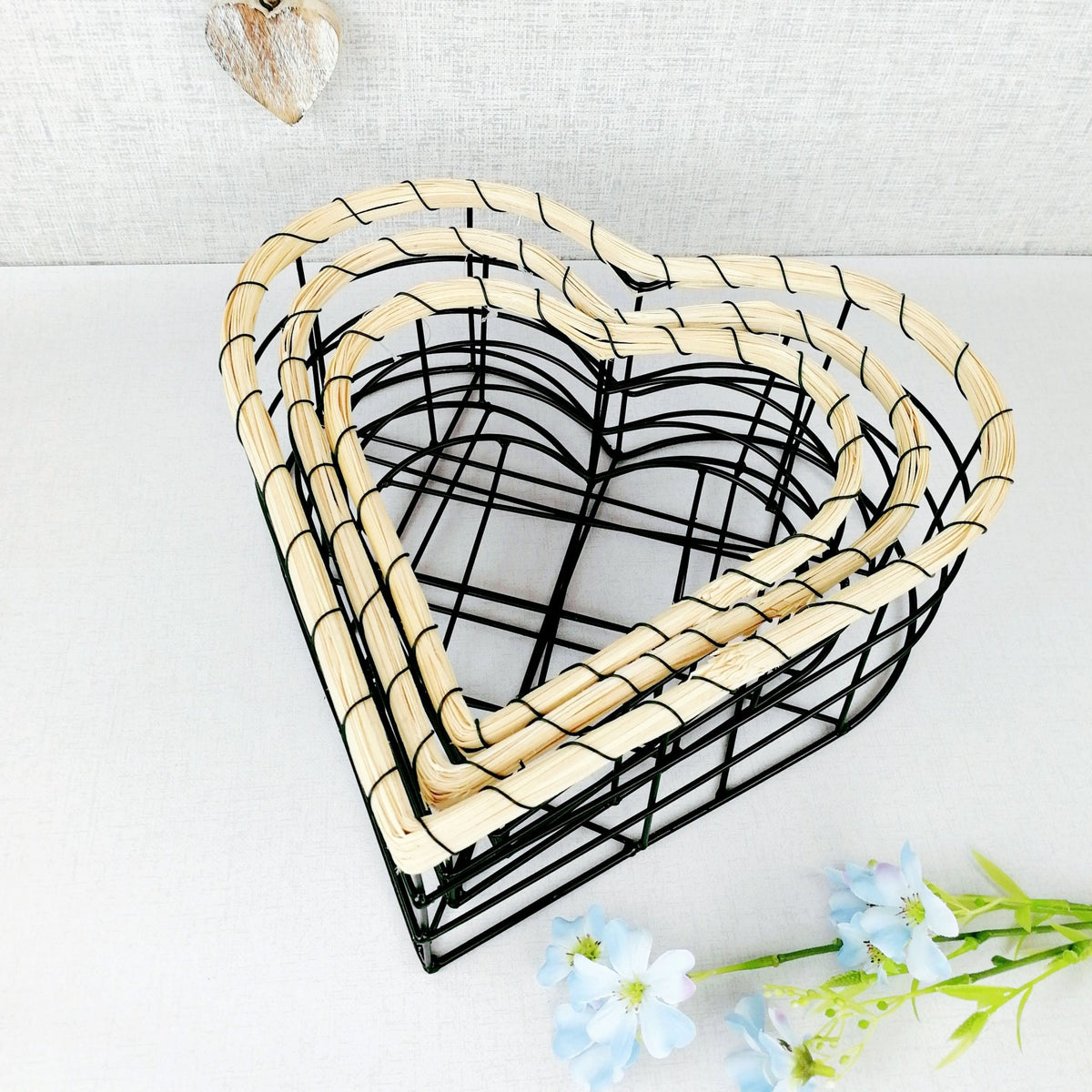 Black Wire Heart Storage Baskets Stacked with Flowers