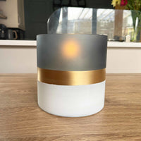Contra Frosted Glass Votive Candle Holder on wooden table