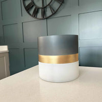 Contra Frosted Glass Votive Candle Holder with panelled wall in background