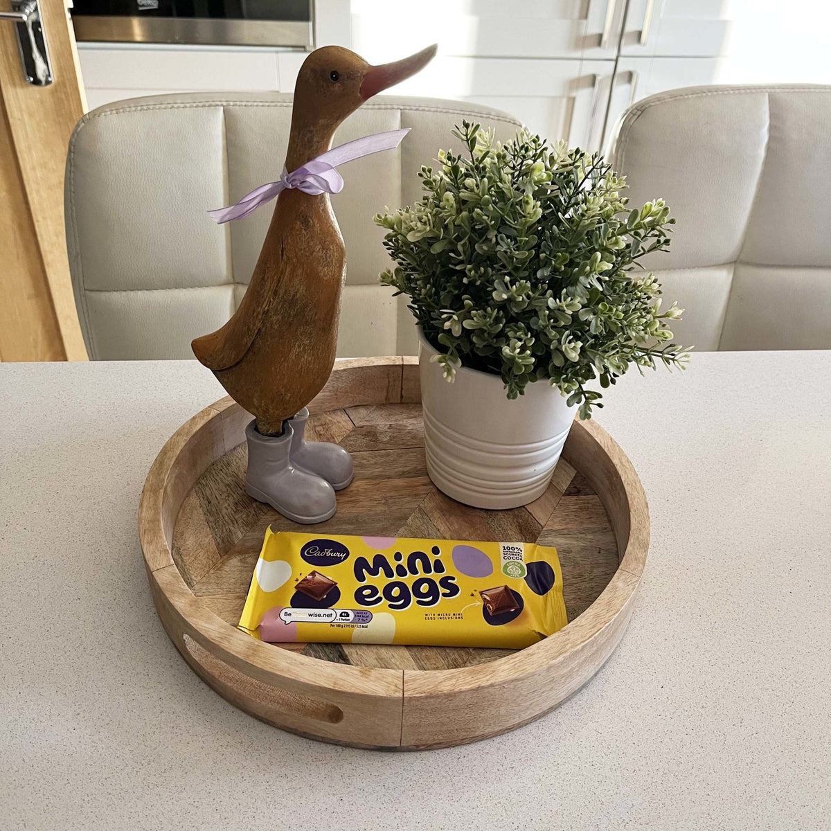 Darcey Duck on our Herringbone Wood Tray with white planter and Mini Eggs Chocolate bar