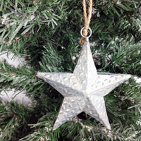 Decorative Metal Hanging Star on Christmas Tree