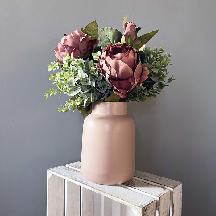 Dusty Pink Spray Rose Peony with leafy spray in pink vase.