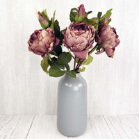 Dusty Pink Spray Rose Peony, 3 roses in a grey vase with white background.