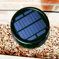 Flame Effect Solar Powered Garden Light close up top view of the solar panel