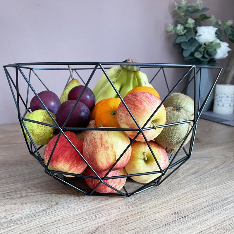 Geometric Contemporary Wire Storage Basket Fruit Bowl with Fruit in on a dining table