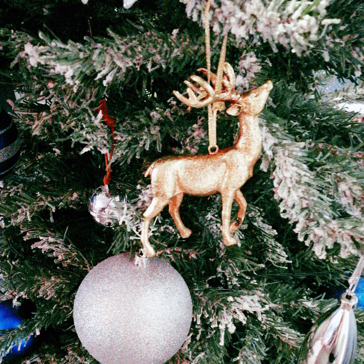 Hanging Gold Stag Decoration on Christmas Tree