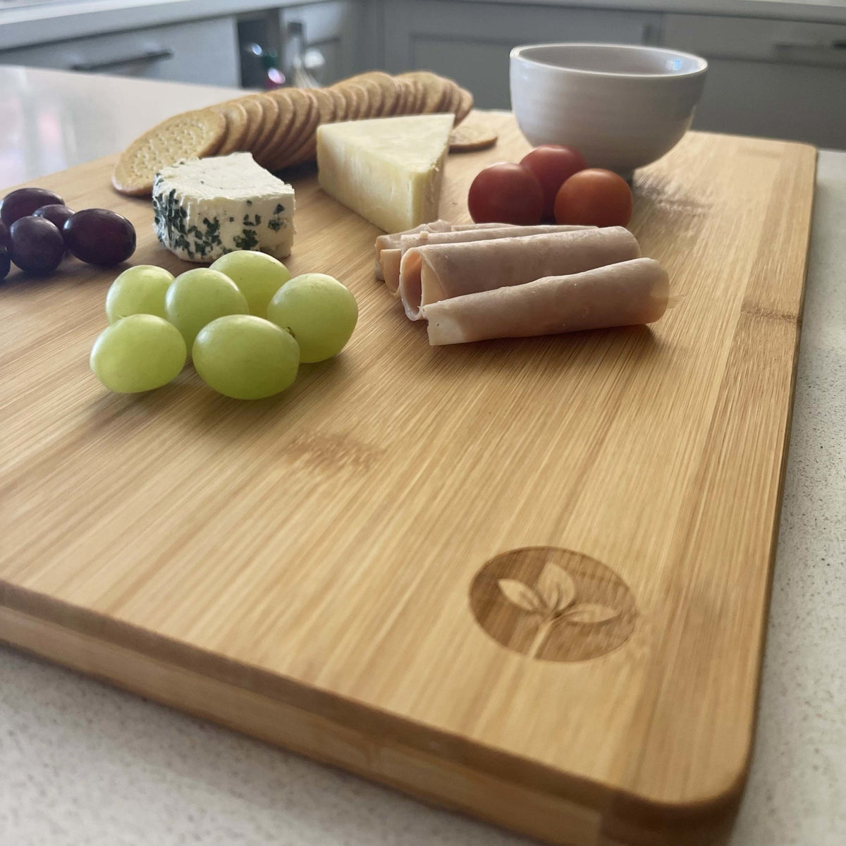Large Bamboo Serving Board platter, on kitchen bench