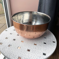 Large Hammered Copper-style Bowl on grey side table in a kitchen