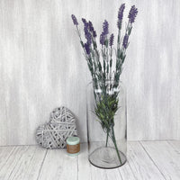 Large Lavender Spray in clear vase with heart decor and green candle