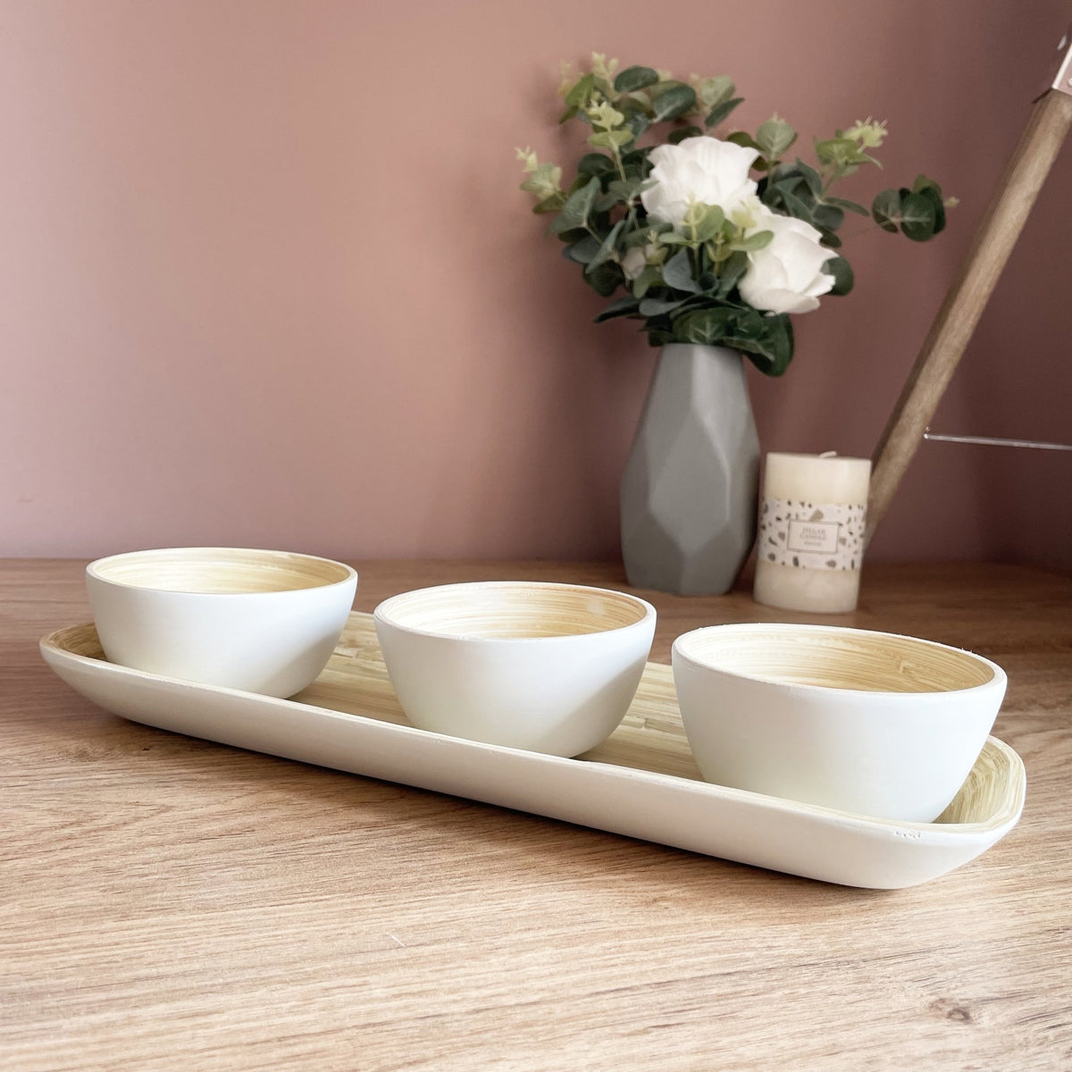 Pandam Bamboo Bowl Set on a dining table with flower vase