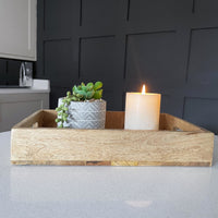 Rectangular Herringbone Wooden Serving Tray small with planter and lit candle on a black background