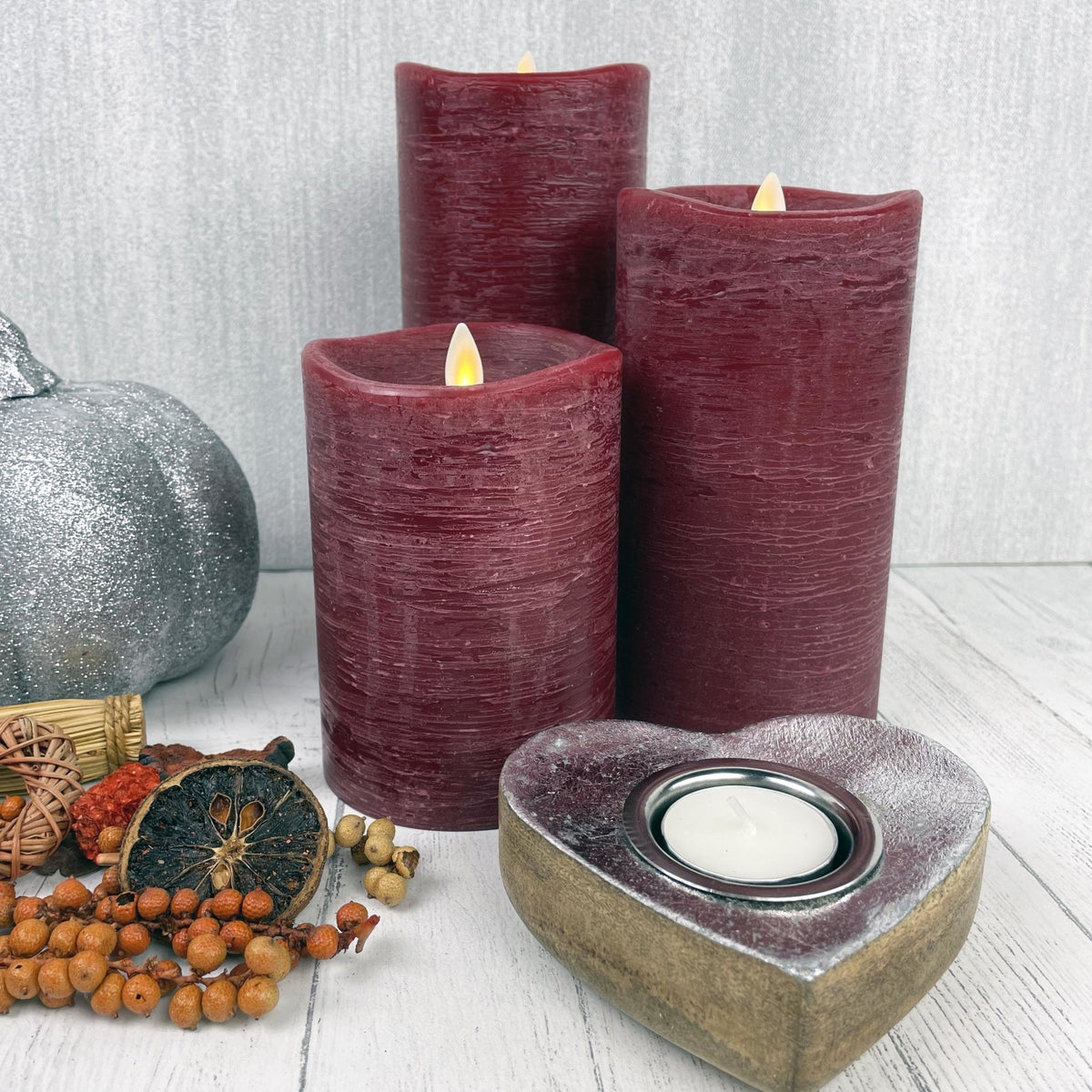 Red Luminara Flame Effect Battery candle set of 3, with autumn decor and a heart tealight holder