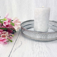 Regiis Silver Style Mirror Tray with grey candle and pink flowers