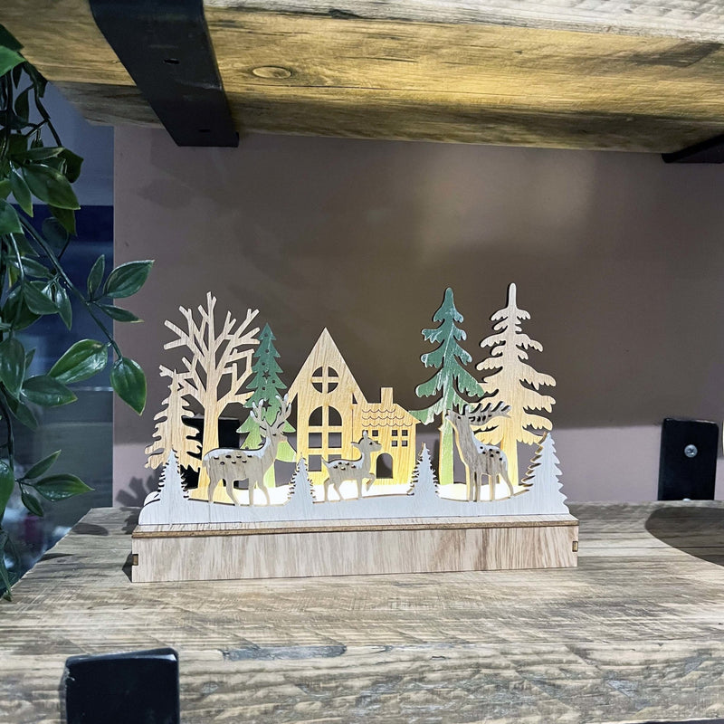 Reindeer & Trees LED Scene Decoration lit up on kitchen shelving