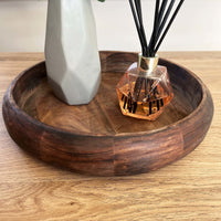 Rich Mango Wood Tray close up with reed diffuser and grey vase.
