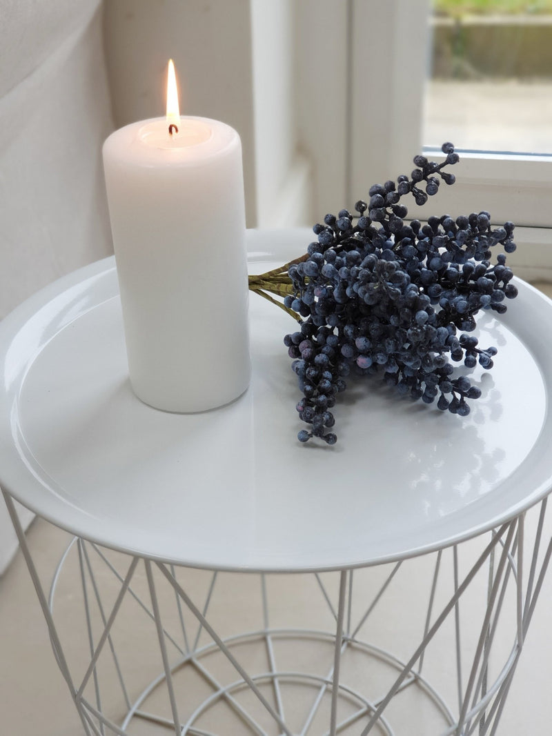 White metal tray table geometric close up with candle and lavender