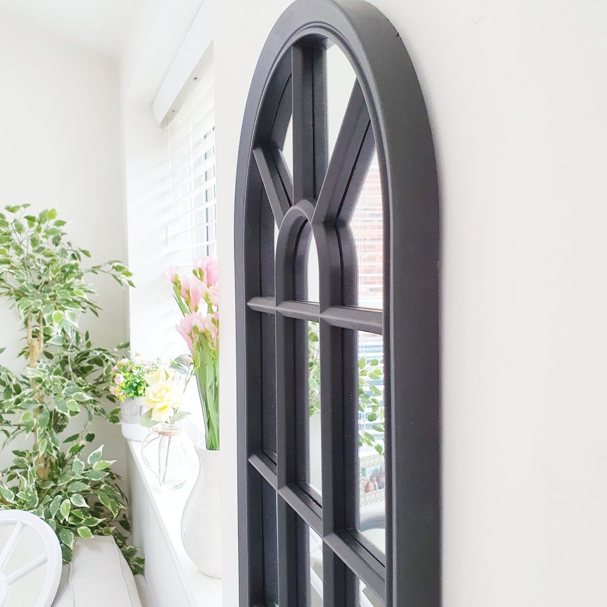 Velit Window style wall mirror in black, close up side view