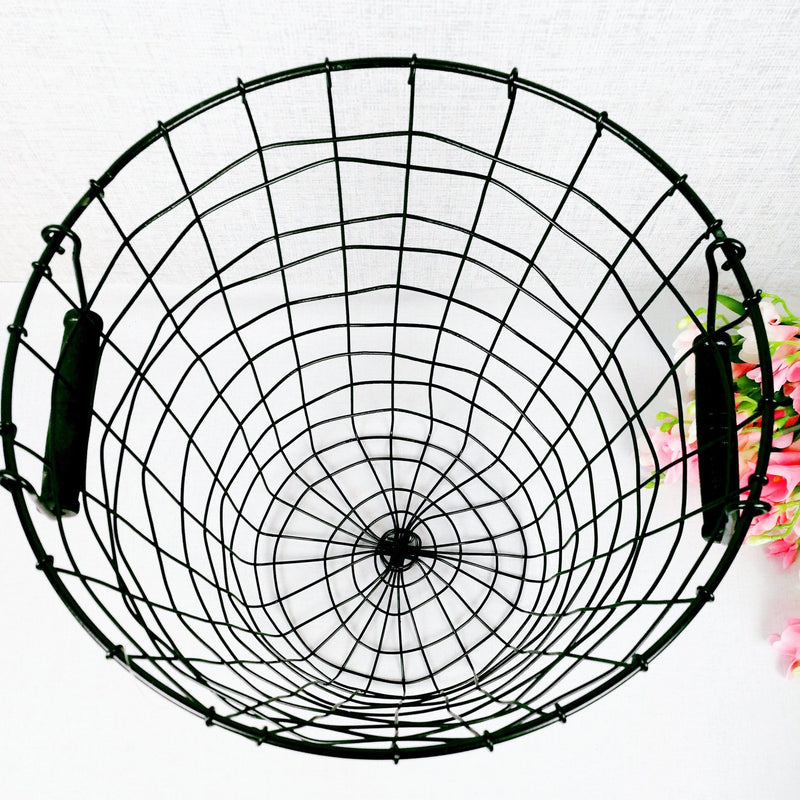 Black metal wire basket with handles top view